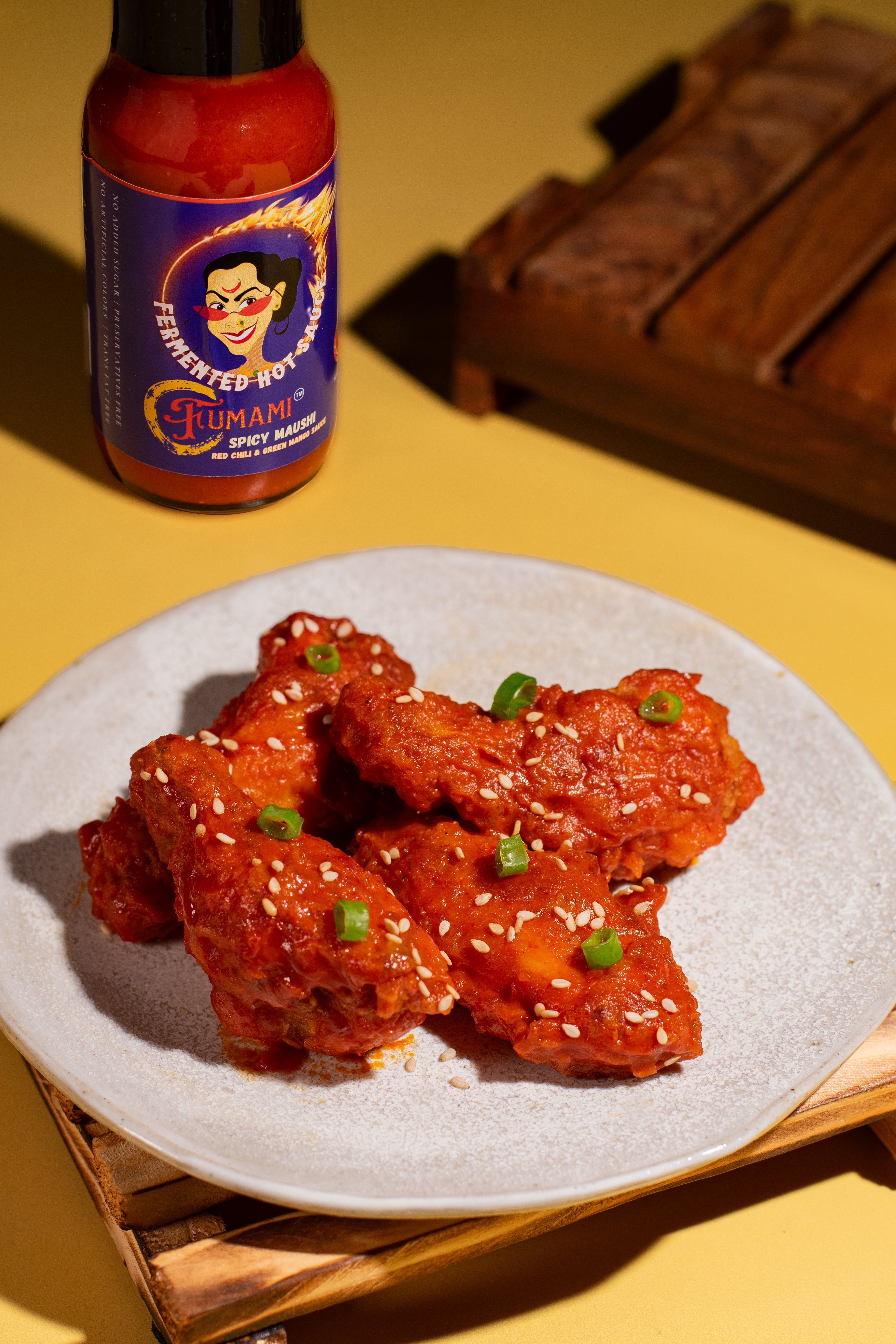 Chicken Lollipops with Fumami Spicy Maushi